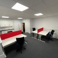 Maestro cantilever desks with altino mesh chairs and bespoke red desks screens